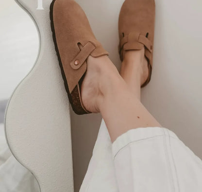 Qorvira suede clogs worn